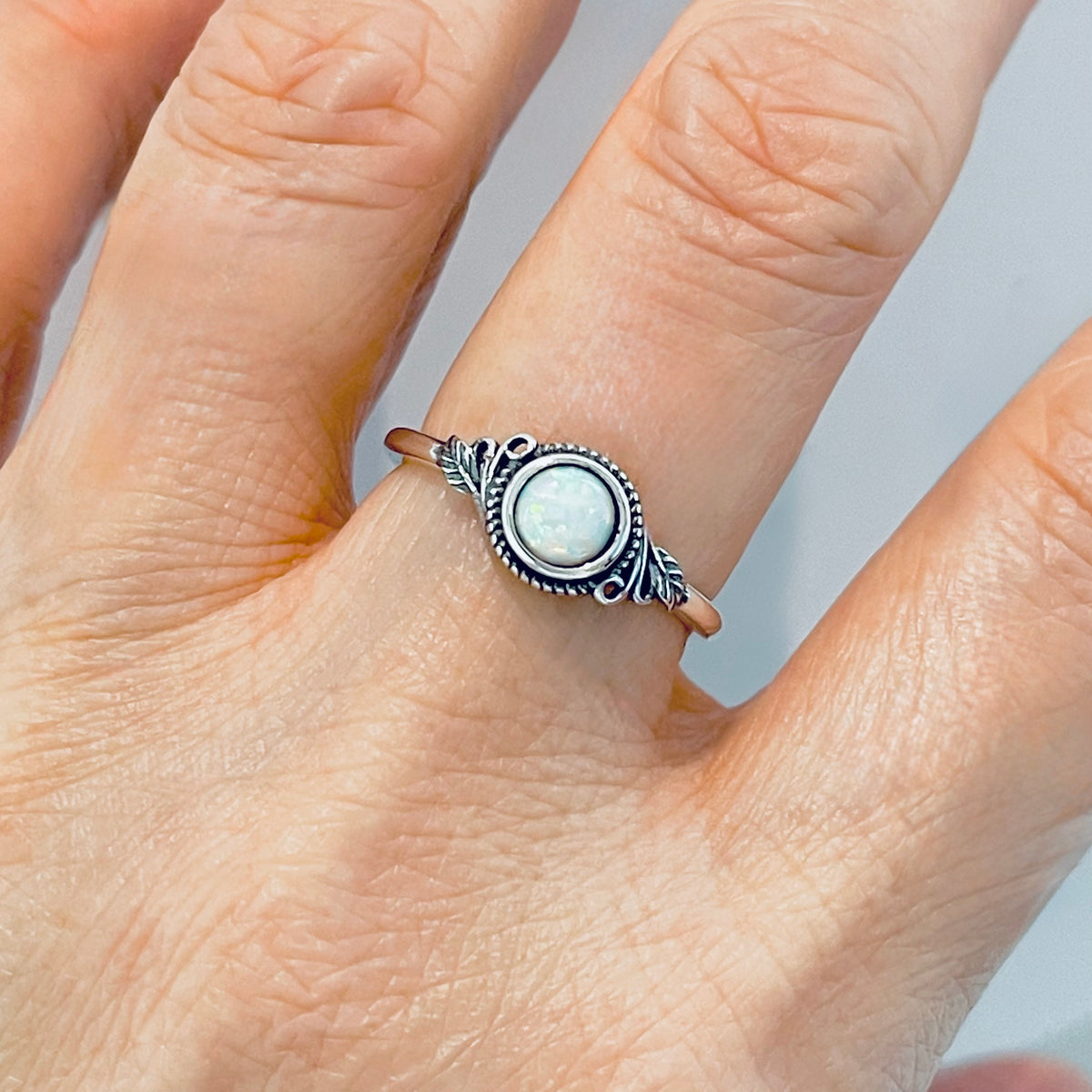 Sterling Silver Small Round White Lab Opal Ring With Leaf | October Birthstone Rings
