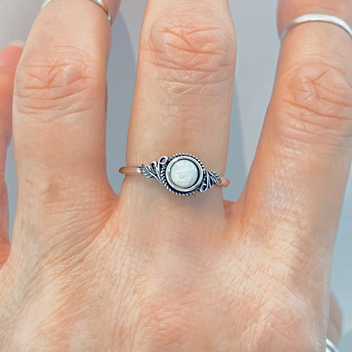 Sterling Silver Small Round White Lab Opal Ring With Leaf | October Birthstone Rings