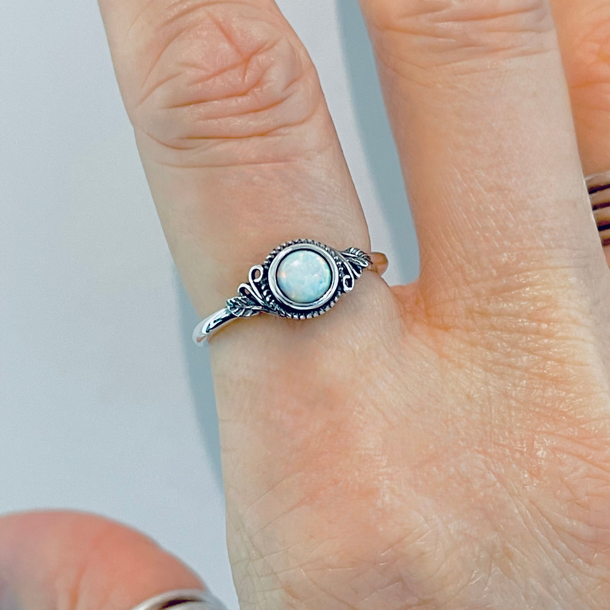 Sterling Silver Small Round White Lab Opal Ring With Leaf | October Birthstone Rings