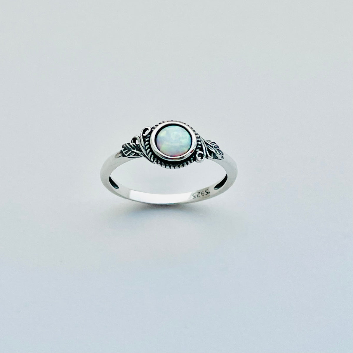 Sterling Silver Small Round White Lab Opal Ring With Leaf | October Birthstone Rings