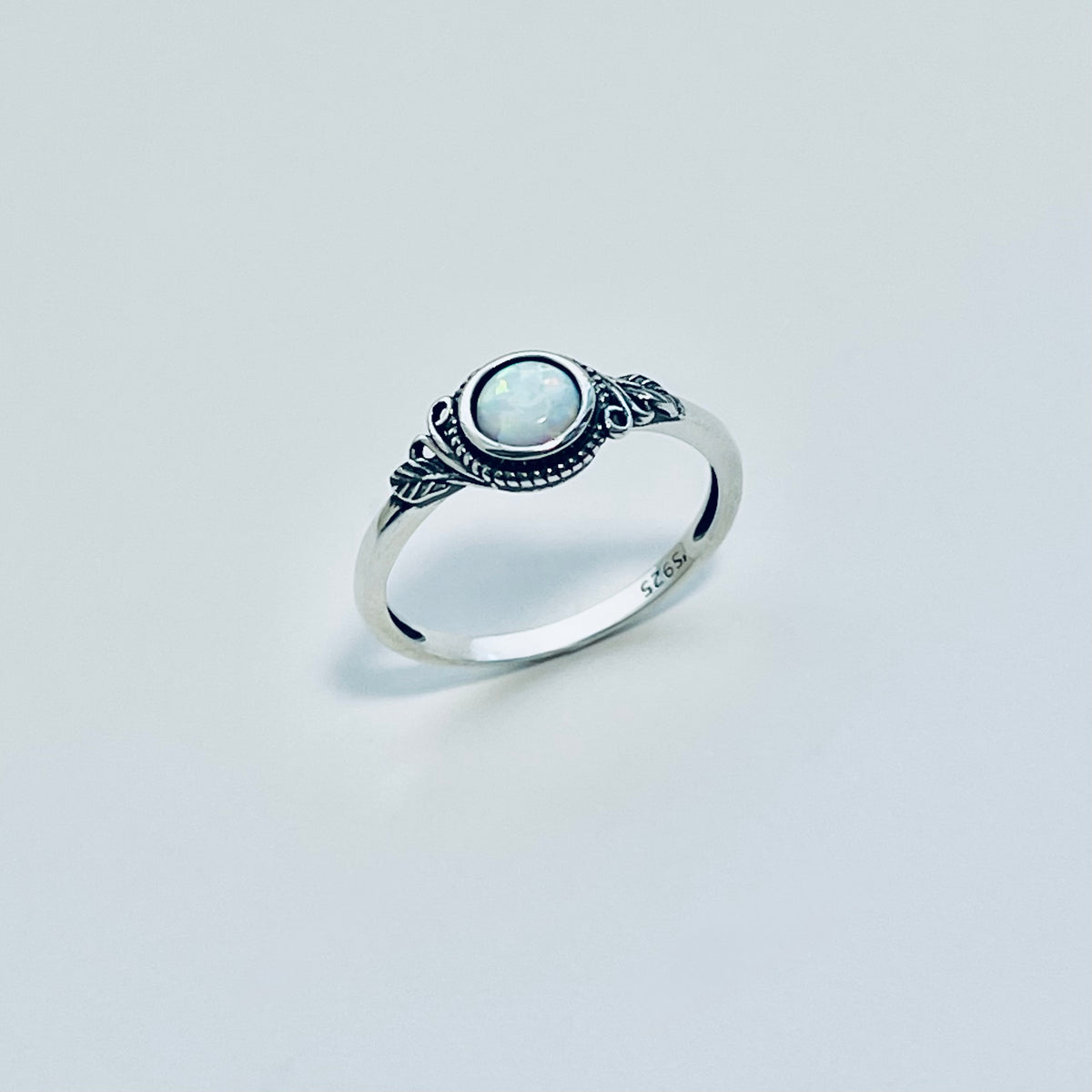 Sterling Silver Small Round White Lab Opal Ring With Leaf | October Birthstone Rings