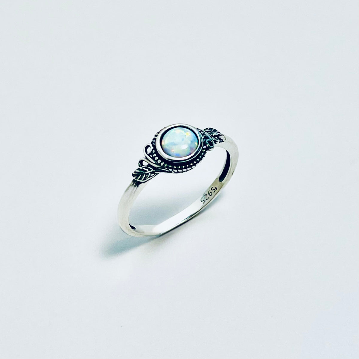 Sterling Silver Small Round White Lab Opal Ring With Leaf | October Birthstone Rings