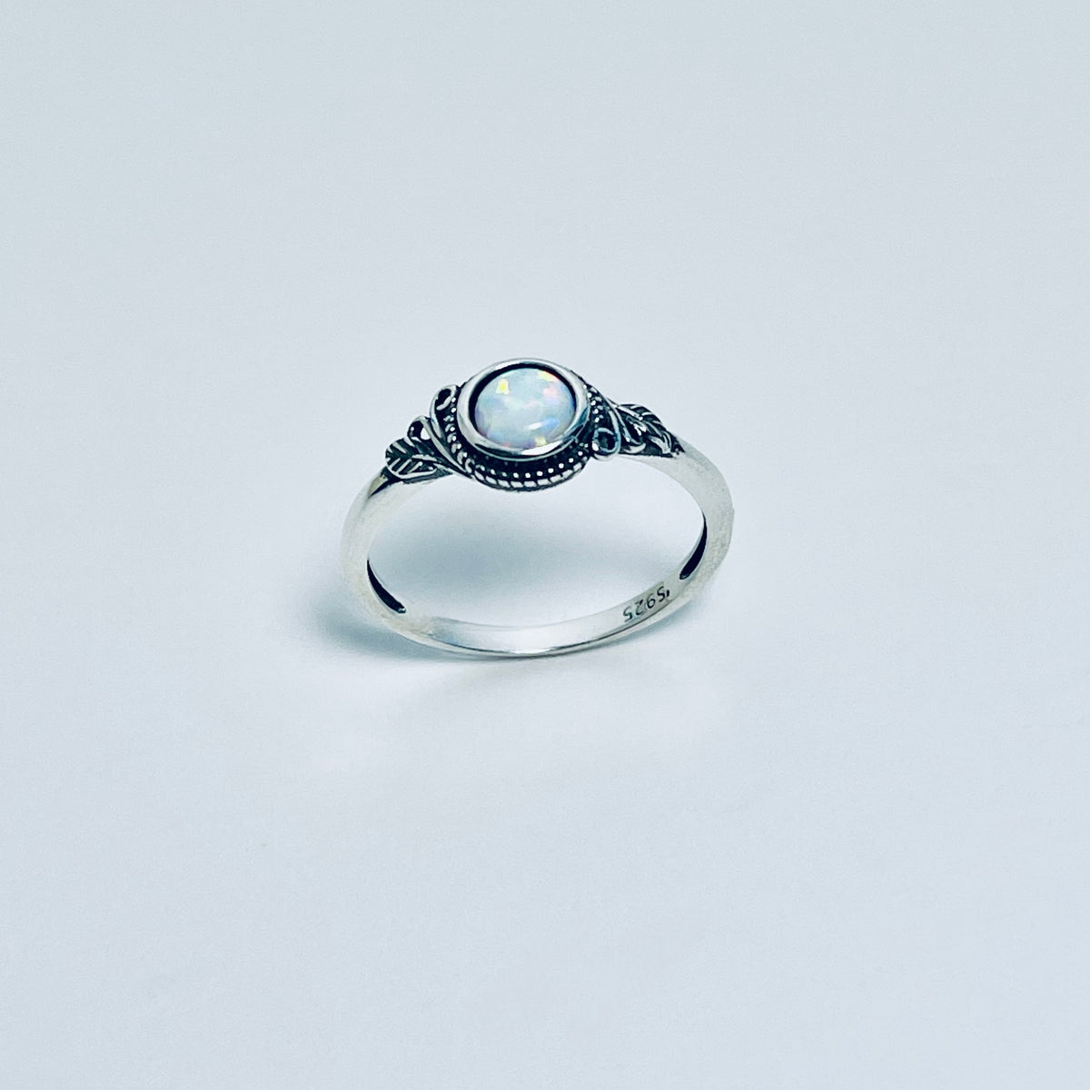 Sterling Silver Small Round White Lab Opal Ring With Leaf | October Birthstone Rings