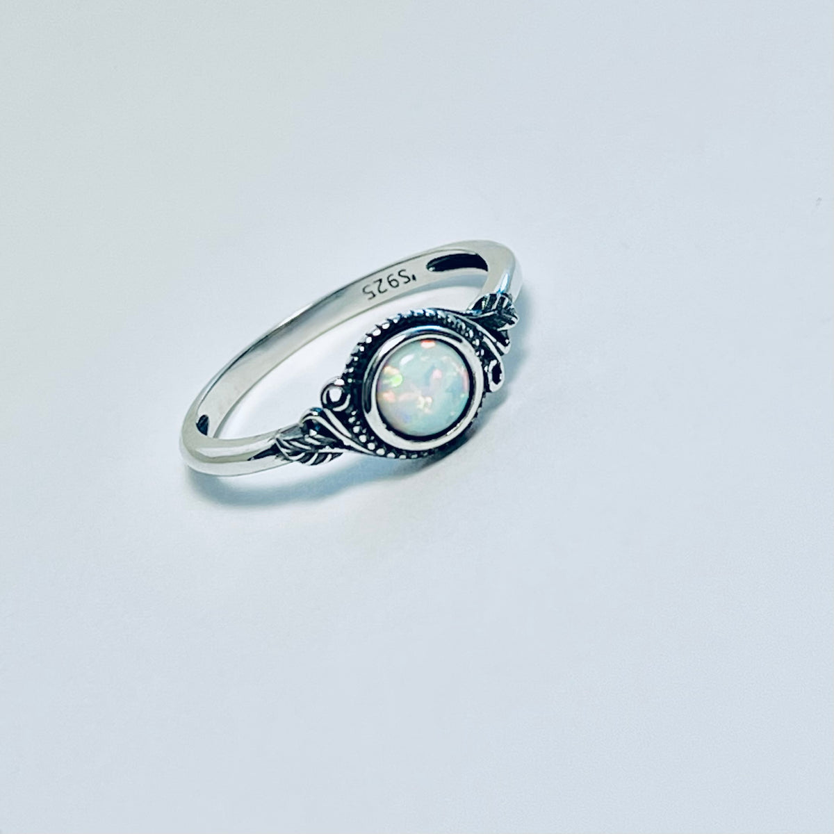 Sterling Silver Small Round White Lab Opal Ring With Leaf | October Birthstone Rings