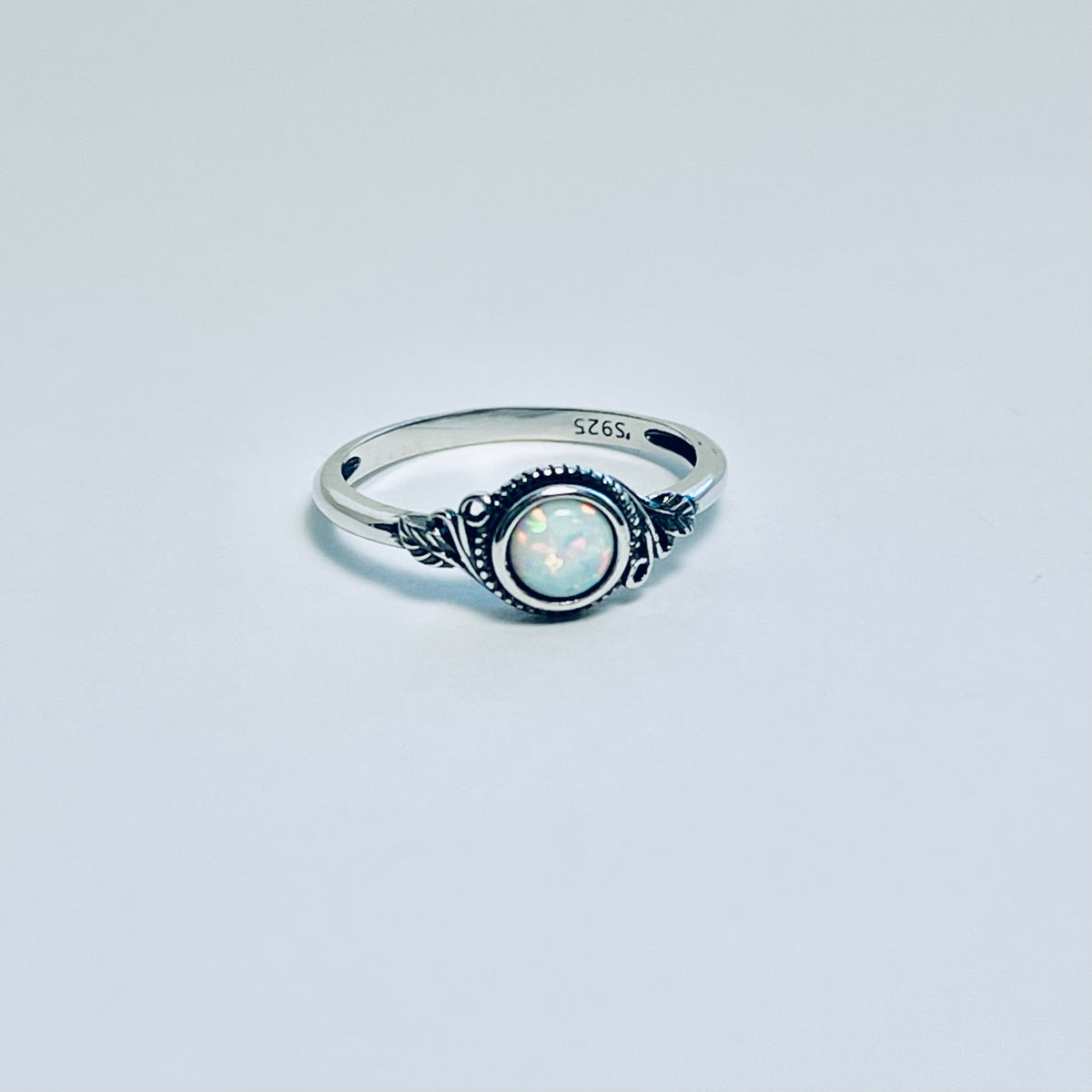 Sterling Silver Small Round White Lab Opal Ring With Leaf | October Birthstone Rings
