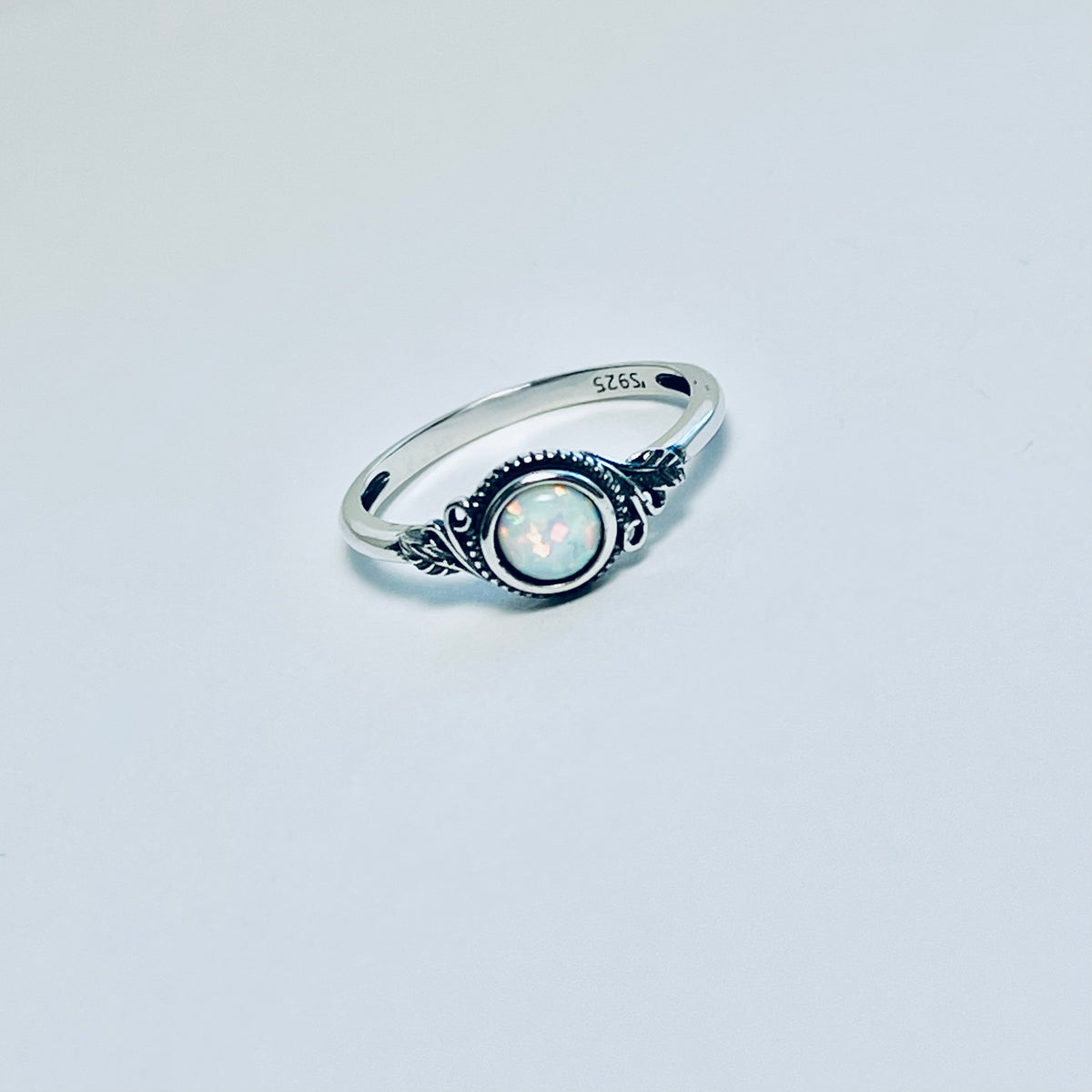 Sterling Silver Small Round White Lab Opal Ring With Leaf | October Birthstone Rings