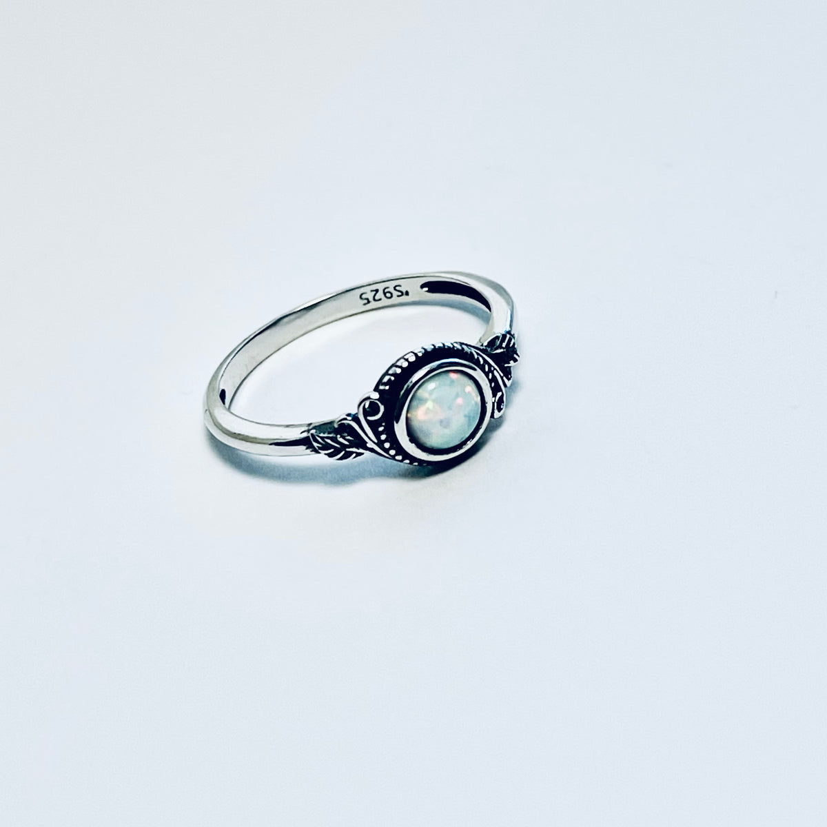 Sterling Silver Small Round White Lab Opal Ring With Leaf | October Birthstone Rings